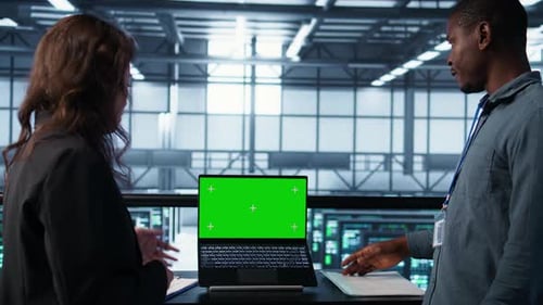 Data Center System Administrators Using Mockup Laptop