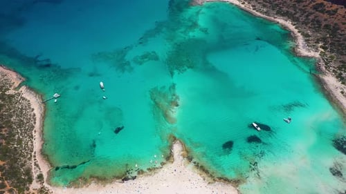 Aerial of Balos Beach and Lagoon with turquoise water, mountains and cliffs in Crete, Greece.