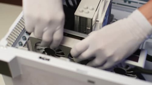 Top View of Unrecognizable Master Repairman Assembling PC System Unit Install Mounting Video Card of