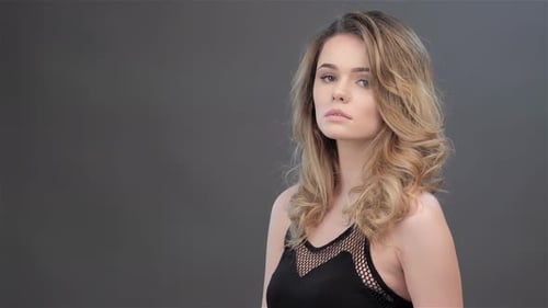 Young Woman Posing in Studio Close Up