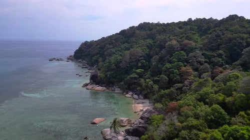 untoucht beach at granite rocks island, turquoise water. Majestic aerial view flight drone