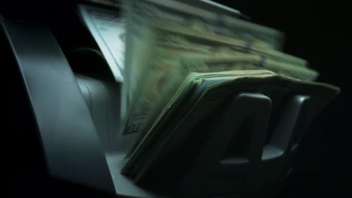 Money Counter Machine Counting US Hundred Dollar Bills