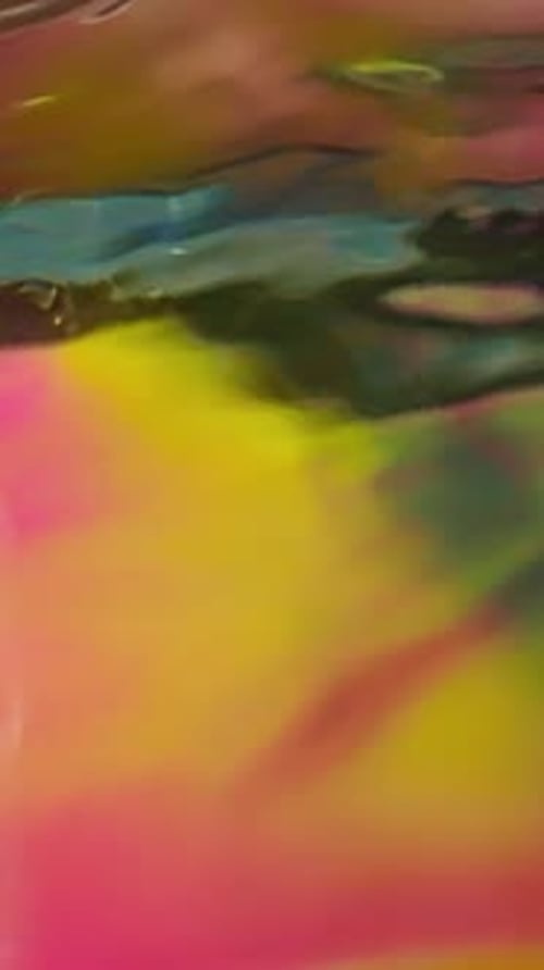 Colorful Paint Underneath Reflective Water