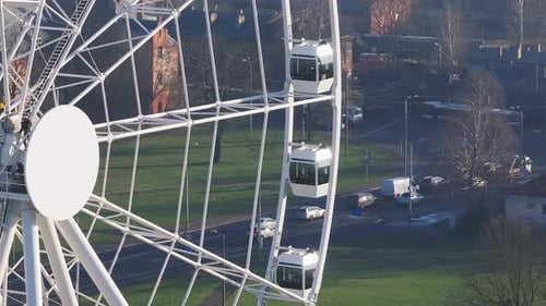 Riga's Skyline Features a Ferris Wheel Historic Church Spires and the Daugava River