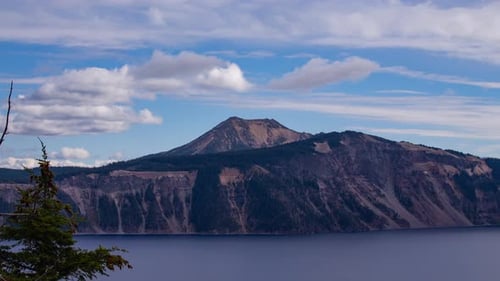 Time lapse - Beautiful Clouds over the mountain range in Crater Lake