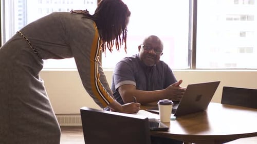 Business People with Laptop Meeting Talking in Office 2529 Years