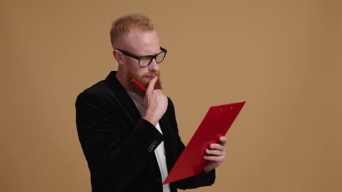 Closeup View of Young Entrepreneur Making Financial Analysis