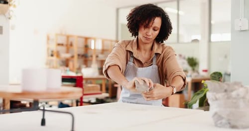 Clay, crafting and pottery with woman in boutique for creative manufacturing