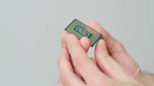 CPU in a Man's Hand