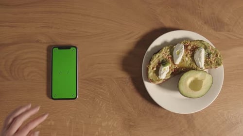 Woman Using App to Calculate Calories Healthy Eating and Diet Concept Smartphone with Green Screen