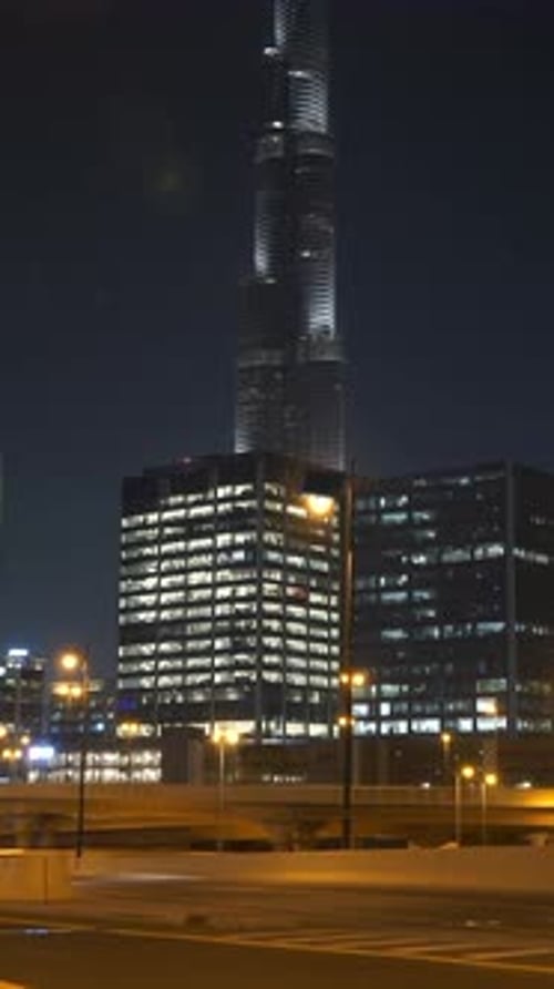 Experience the Stunning Night View of Burj Khalifa and the Urban Skyline of Dubai City