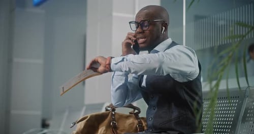 Airport Terminal Entrepreneur Irritated About Flight Delay Talking and Shouting Into Phone