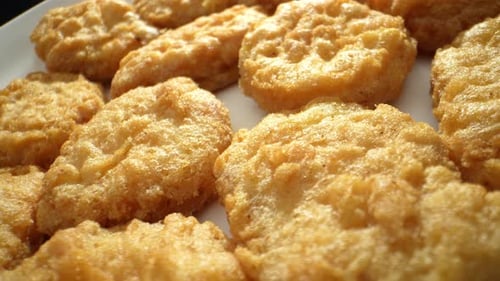 Chicken nuggets in 4K video.