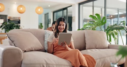 Smile, reading and tablet with woman on sofa for social media post, search and online update