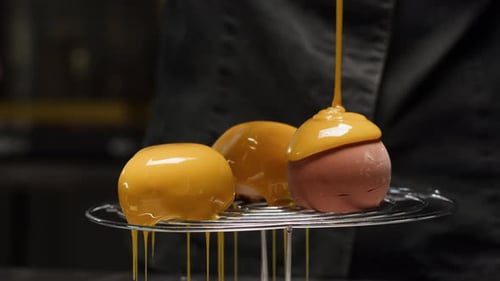 Caramel Glaze Being Poured Over Delicious Desserts