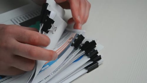 Stack of Papers Folder on Work in Office