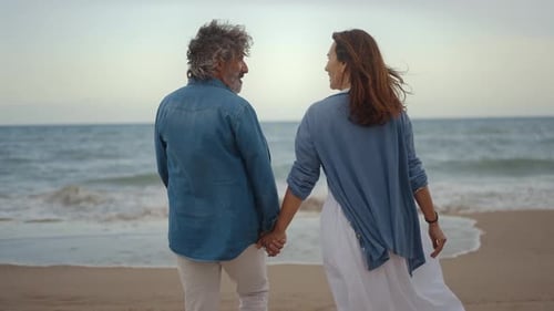 senior couple spending time on the beach