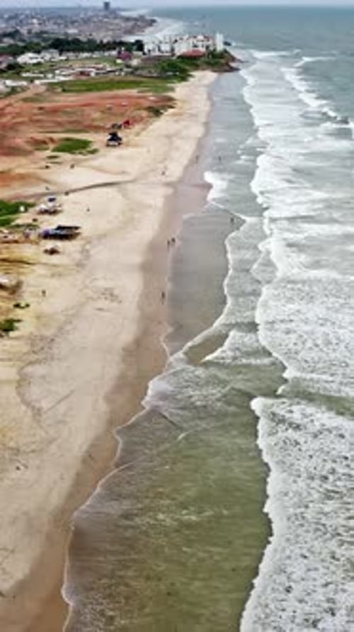 Coastal view of Accra, Ghana showcasing sandy beach and ocean waves