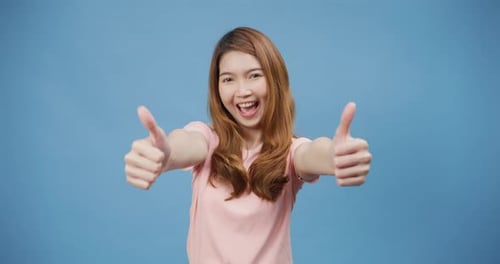 lady wear casual pink smile show thumps up with positive of content and happy stand isolate.