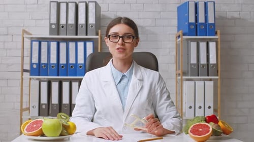 Nutritionist Providing Dietary Advice in a Modern Clinic Setting