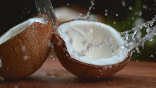 Coconut water splashing in super slow motion