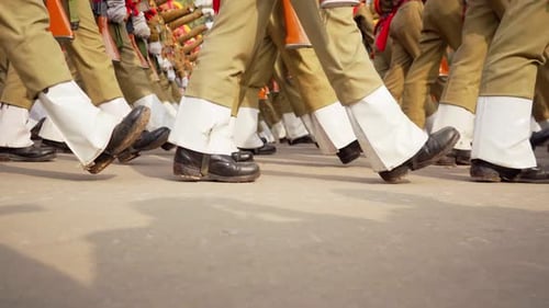 Soldiers Marching in Synchronized Uniform in an Urban Parade