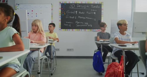 Group of Kids Practicing Digital Skills Studying Programming in Computer Science Classroom