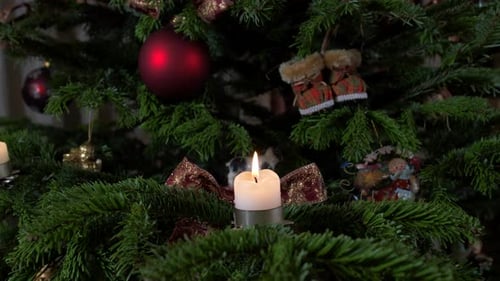 Ornaments and Candles on Christmas Tree