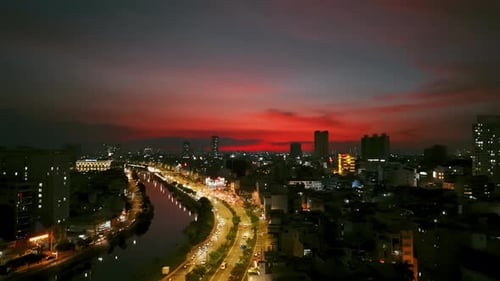 Aerial View Sunset Cityscape Near Canal At Saigon
