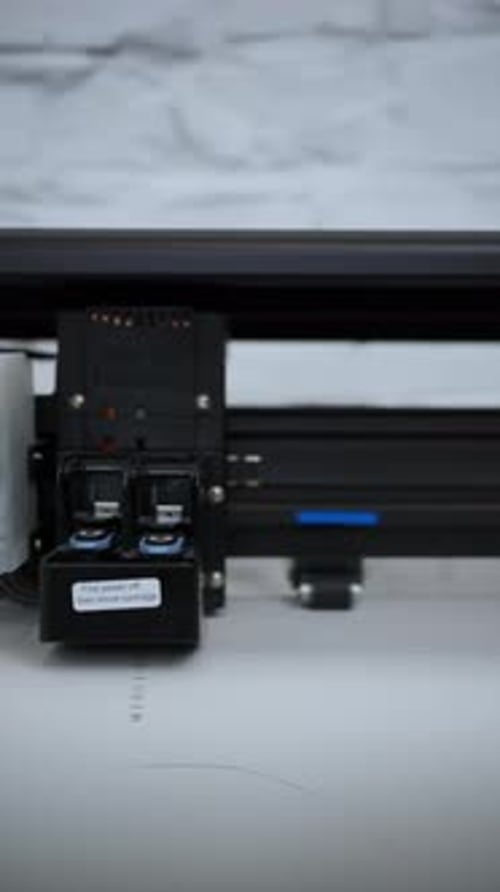 Closeup of Industrial Plotter in Action Concept Industrial Printer