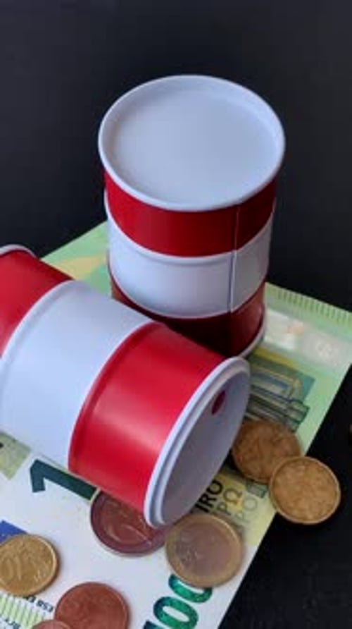 A barrel of oil against a backdrop of euro as a concept for the oil crisis. A barrel of oil