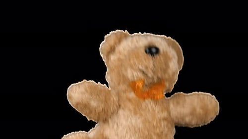 Stuffed and fluffy teddy toy brown bear playing and dancing. Alpha channel included.