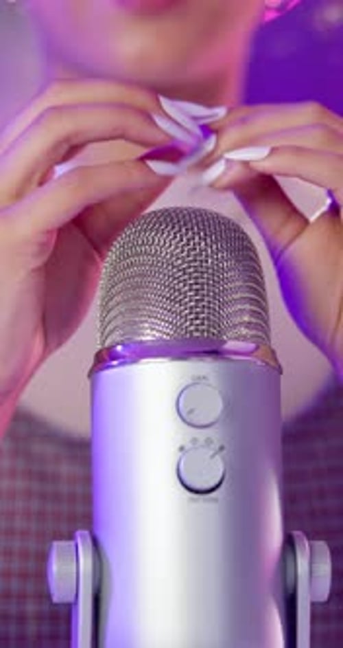 ASMR, microphone and girl hands in studio for scratch, social media or influencer by neon lights