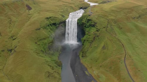 Aerial view of Skogafoss waterfall in Iceland on an overcast day