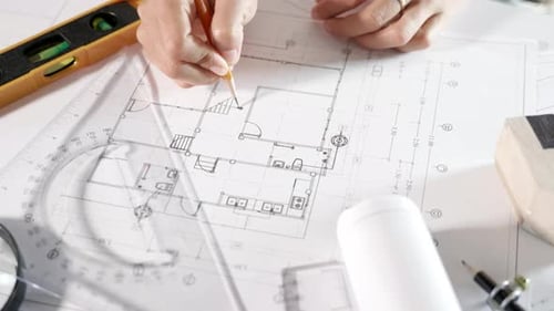 Top View of Architect Drawing with Ruler on House Plan Blueprint Paper for Repair Tools