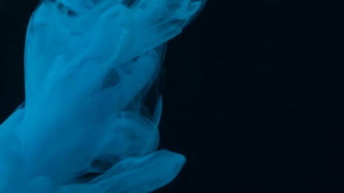Black background with blue paint