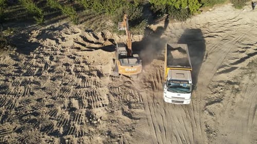 Excavator Loading Soil Drone Shot