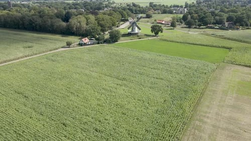 Beautiful aerial towards traditional windmill in rural area