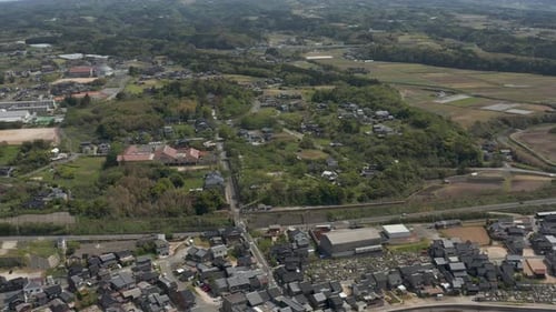 Aerial flying over Rural Japanese Town on Sea of Japan, Mikuriya, Tottori