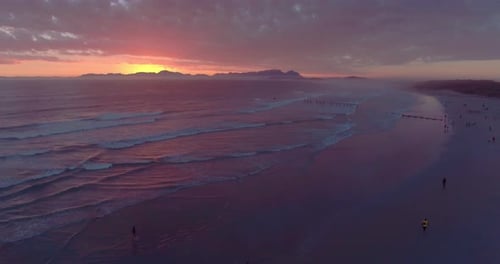 4k drone footage of a beautiful beach at sunset