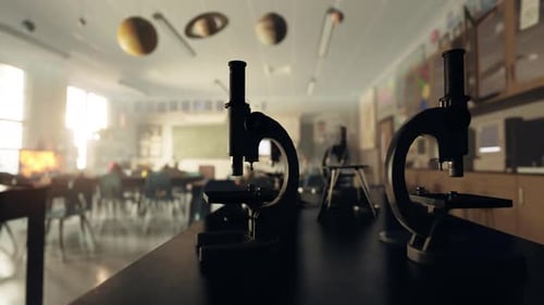 Dois microscópios sentados em cima de uma mesa em uma sala