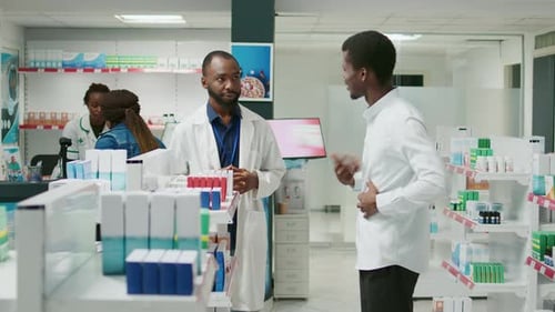 Young Man with Stomachache Asking Pharmacist for Pills
