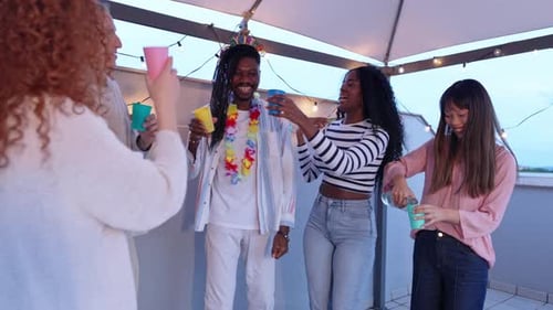 Friends Celebrate Birthday on Urban Rooftop Patio