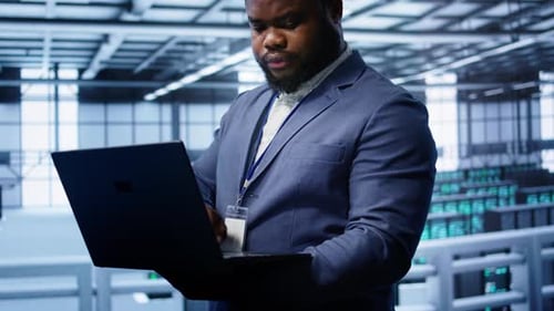 Software Developer in Data Center Runs System Diagnostic Tests on Notebook