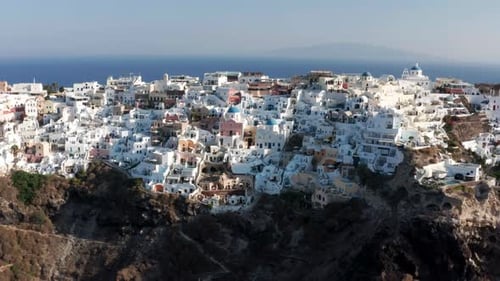 Aerial View Of The Famous Village Of Oia At The Clifftop In Santorini Island in Greece.