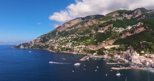 Forward Drone Shot Above Amalfi, Famous Beach Town on Amalfi Coast. Italian Tourist Destination