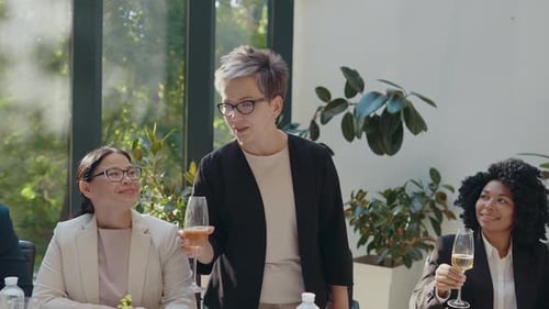Business Team Toasting Champagne at Office Celebration