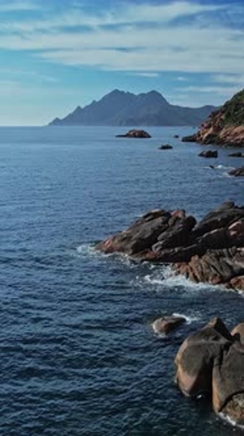 Vast Ocean Stretching Below, Aerial View of Corsica, France