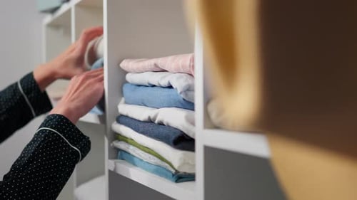 Hangers, Shoppers Stressfully Selecting Clothes from a Huge Variety Assortment of Fashion Clothes