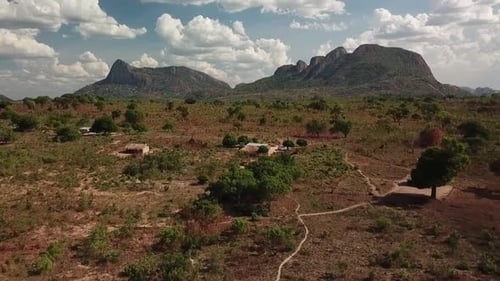 Aerial Drone View of Rural Village in Mozambique with Traditional Huts